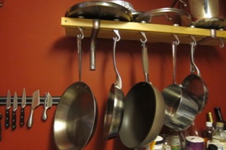 Pots hanging from rack